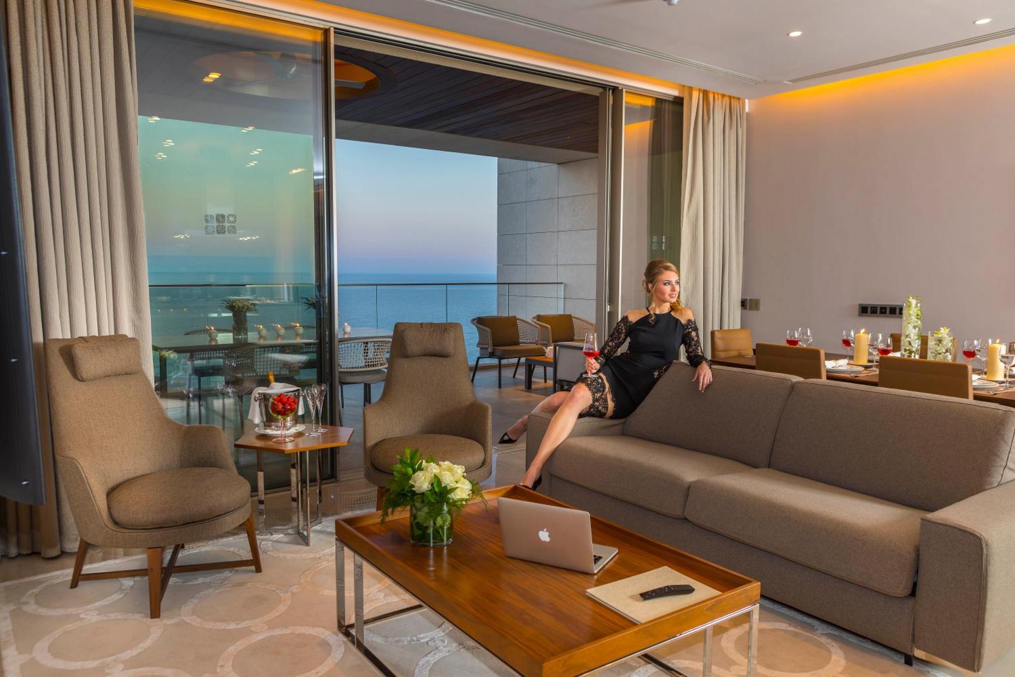 Four Seasons Hotel Agios Tychonas Exterior foto A 3D rendering of a living room