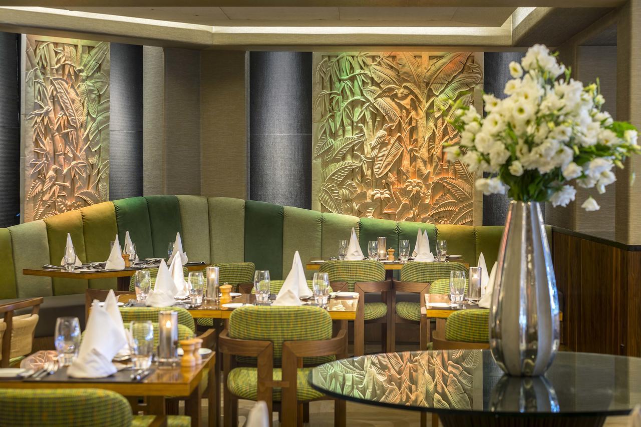 Four Seasons Hotel Agios Tychonas Exterior foto The interior of the restaurant